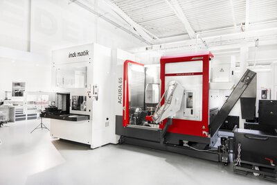 Palettenautomation indunorm Indumatik Light 120 - 5-Achs-Bearbeitungszentrum HEDELIUS ACURA 65 EL