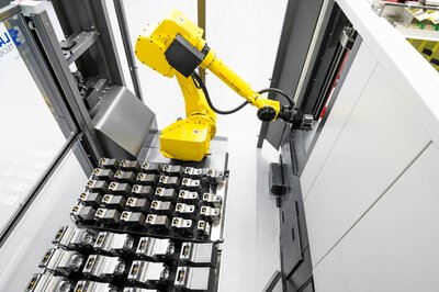 Werkstückautomation Lang RoboTrex - Roboterarm und Spannvorrichtungen